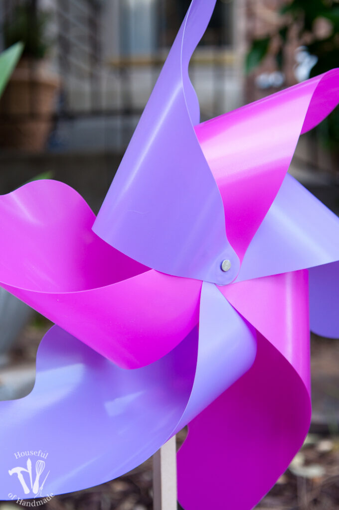 close up of finished pinwheel in purple and pink colors