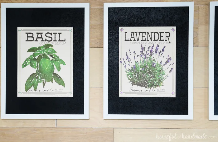 two herb prints on wood wall