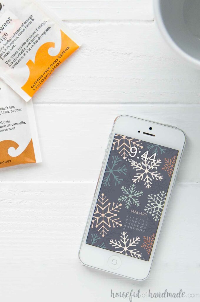 Enjoy a snowy winter with the new free digital wallpaper for January. The bold snowflake design is a beautiful digital background for your phone and computer. 