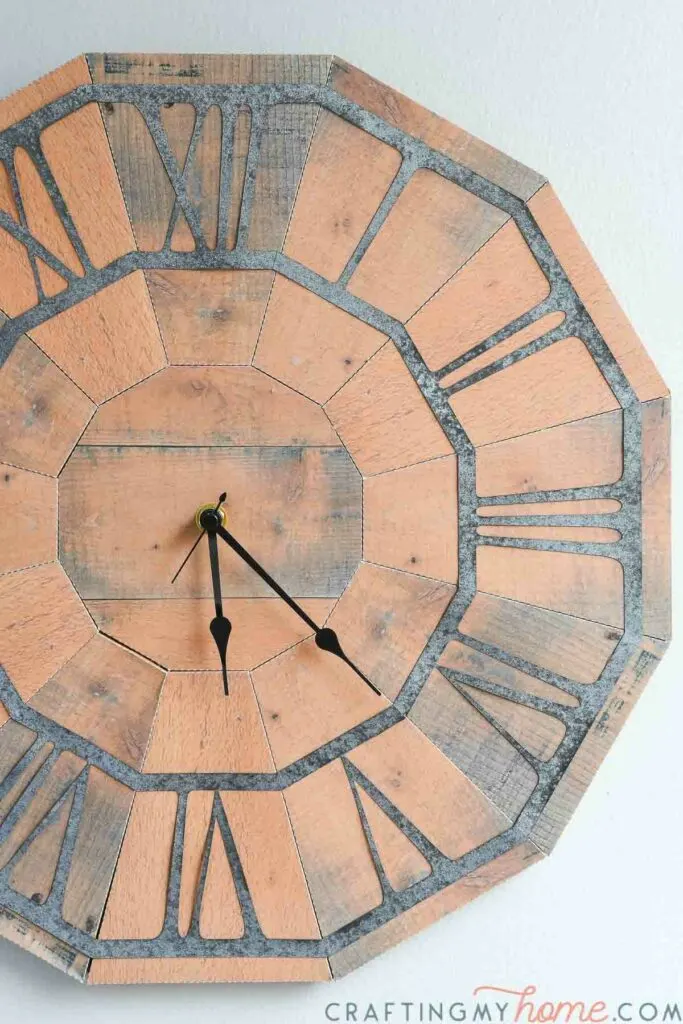Working clock paper craft for home decor made to look like a clock made from pallet wood. 