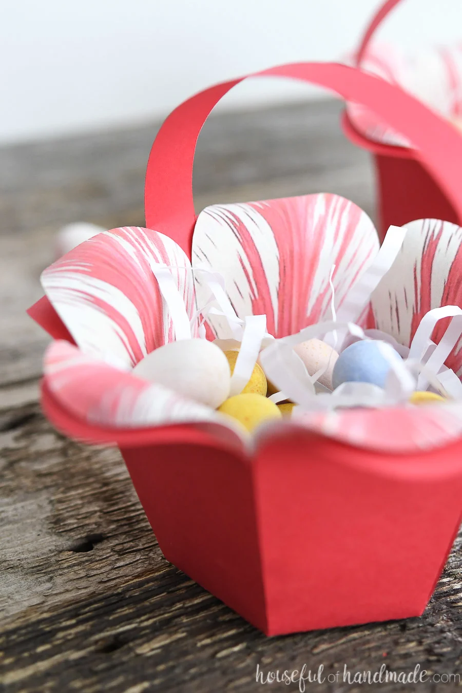 DIY Easter Basket that looks like a spring flower made out of paper.