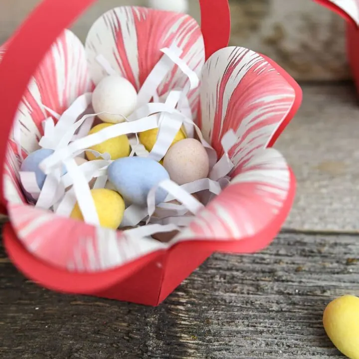 paper easter basket with candy eggs