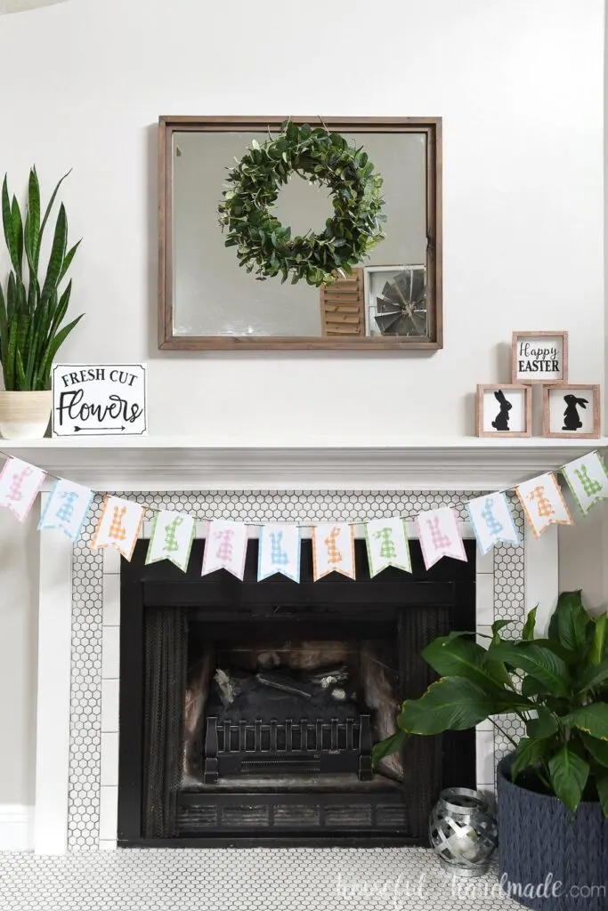White tiled fireplace decorated for spring with paper crafts.