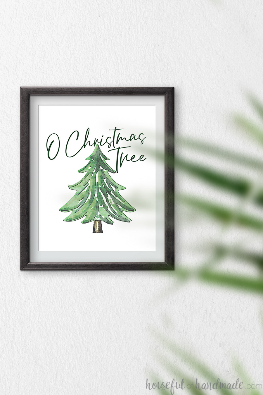 O Christmas Tree script font over the top of a watercolor pine tree as a Christmas art print.