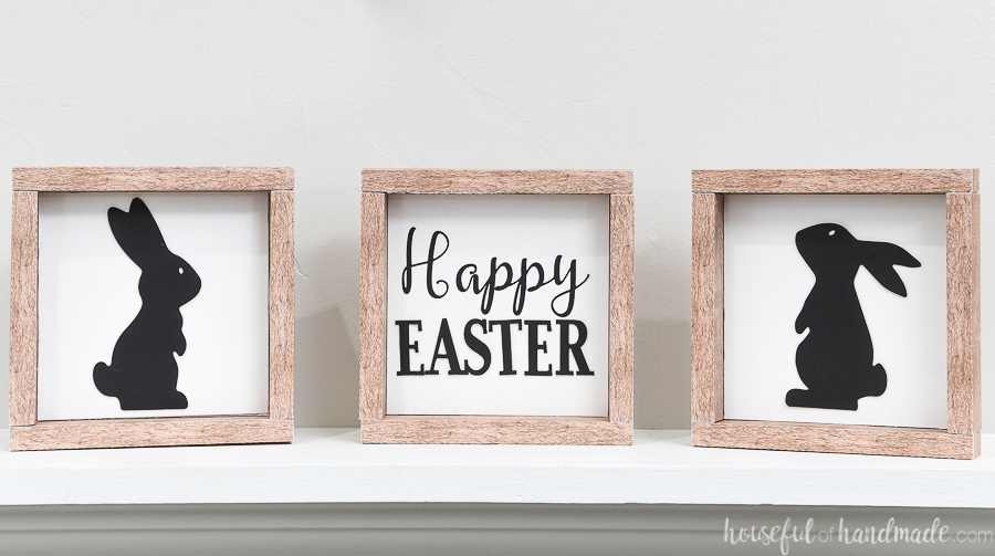 Three small Easter signs: one with an Easter saying and two with bunny silhouettes.