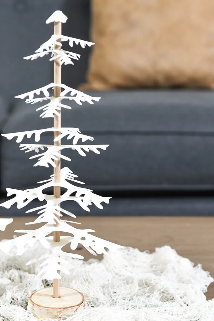 single paper christmas trees set of 2 on coffee table in front of couch