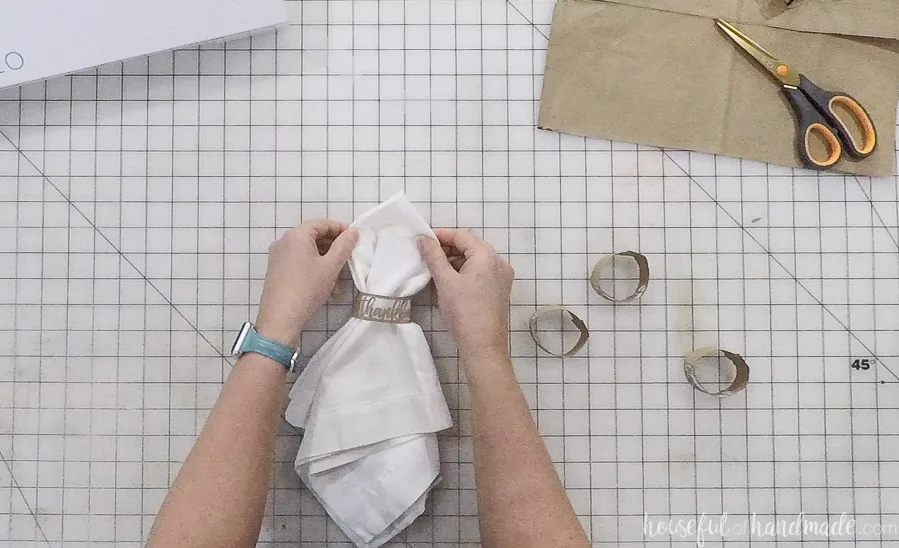 paper thankful napkin ring added to white cloth napkin