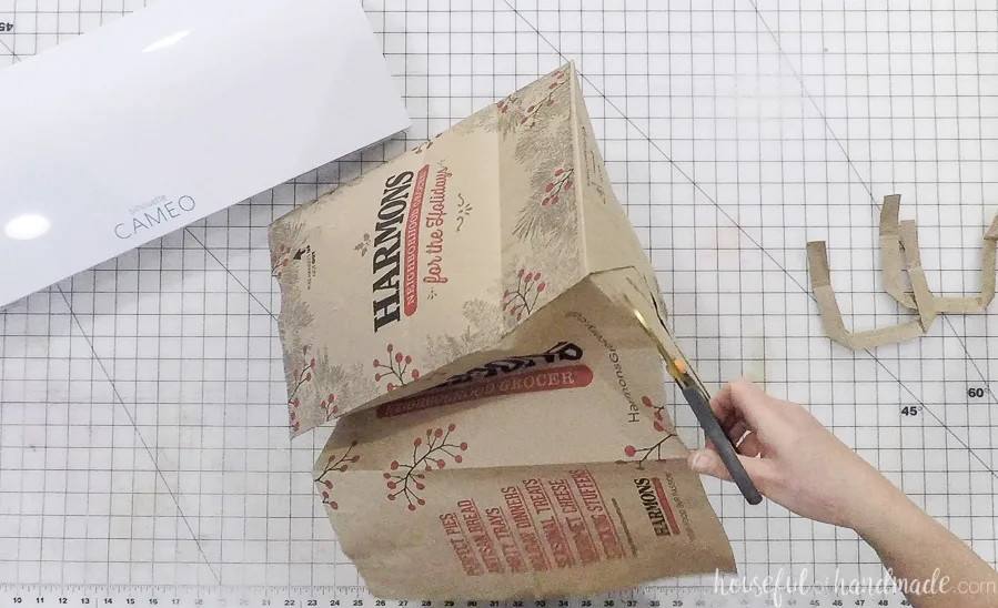 cutting out paper bag for diy thankful napkin rings