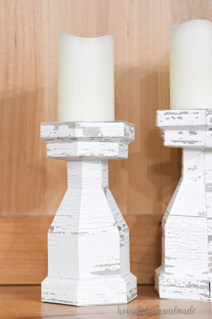 Close up of the faux wood farmhouse candlesticks made from paper. 