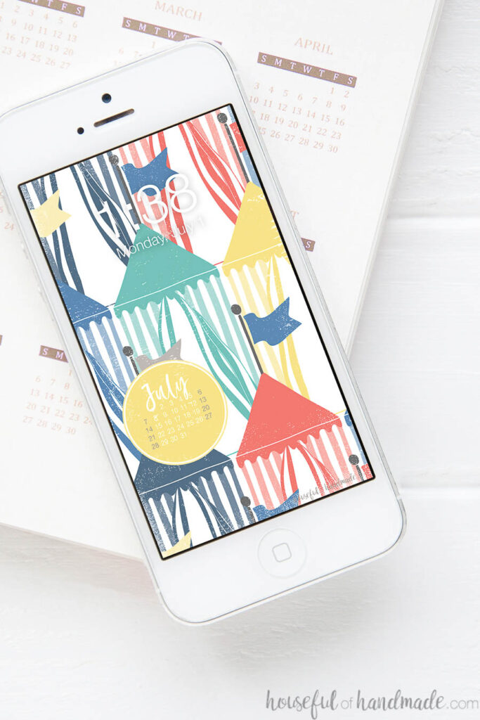 White iPhone with vintage beach hut print digital wallpaper on the screen.