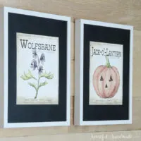 Two printable Halloween art pieces in a frame