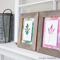 Two rustic frames with water color leaf art