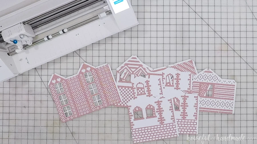 cut out paper village houses with silhouette