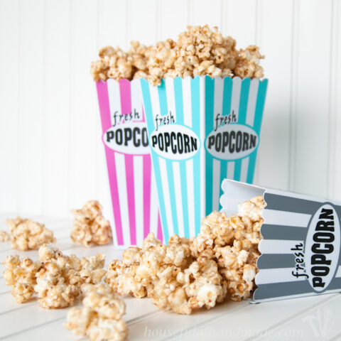 Churro Caramel Popcorn in popcorn tubs