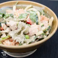 Healthy creamy italian pasta salad in a glazed bowl.