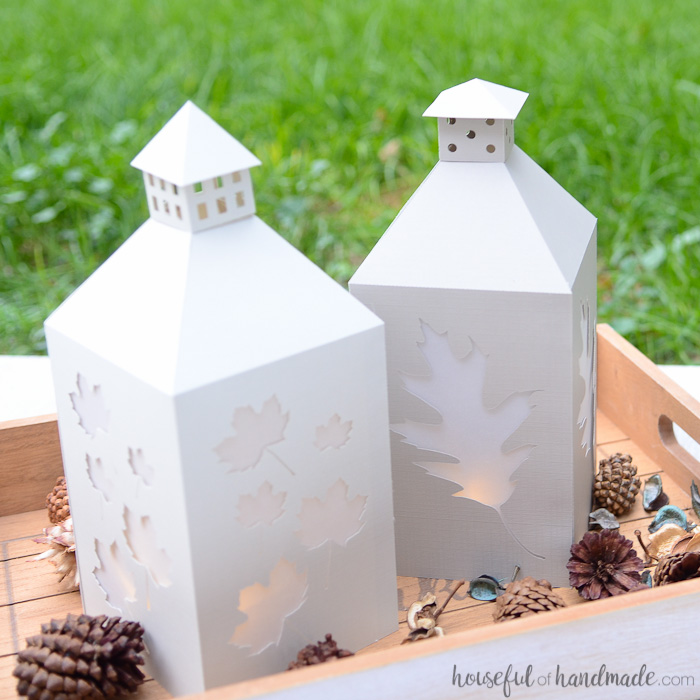 Create stunning fall decor on a budget with these easy DIY candle lanterns. The falling leaves are perfect to add a touch of autumn to your home.