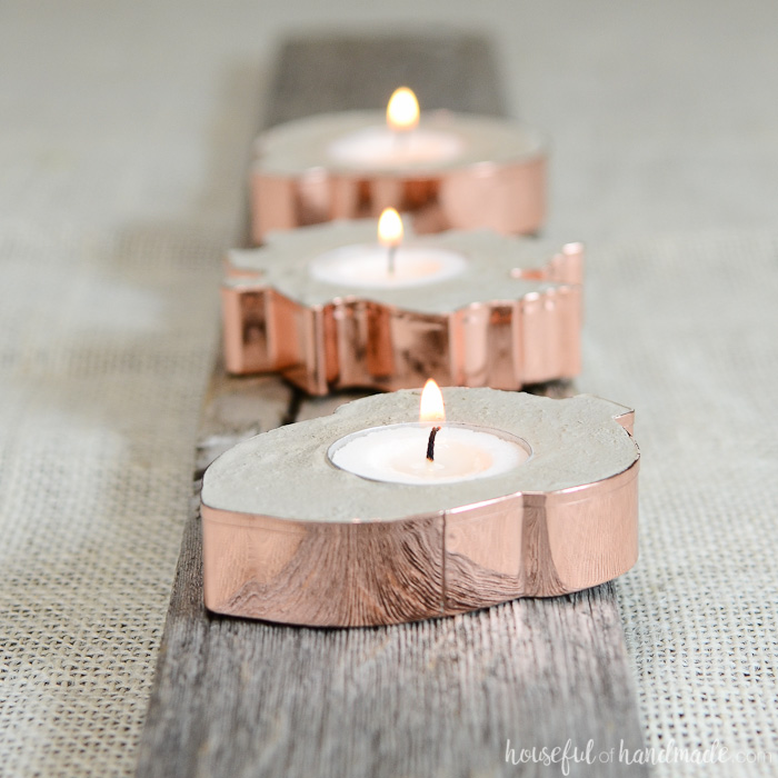Create the perfect rustic fall decor with these easy to make copper candle holders. Concrete and copper are beautiful for fall! 
