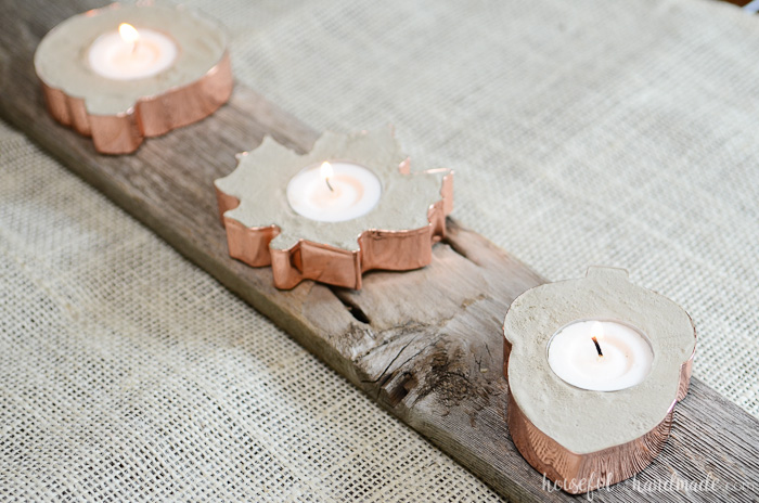 I love these beautiful fall candle holders! They are so easy to make with concrete and cookie cutters. 