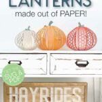 Three paper lanterns shaped like pumpkins in a vignette for fall with text overlay: Pumpkin lanterns made out of paper!