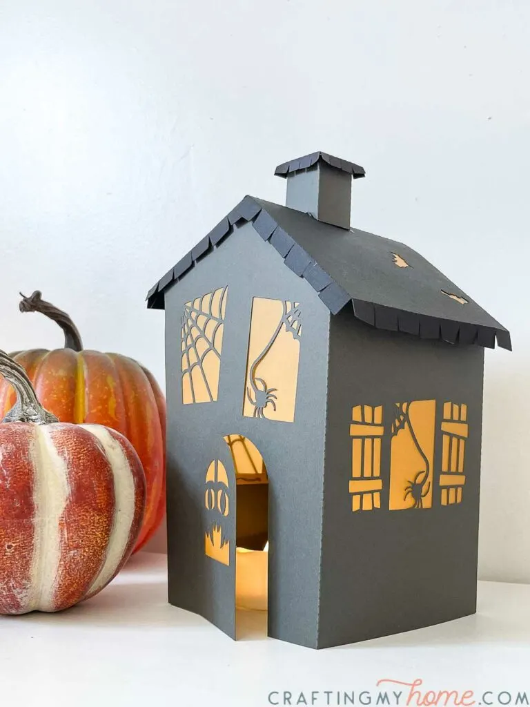 Side view of the haunted house paper halloween lantern. 