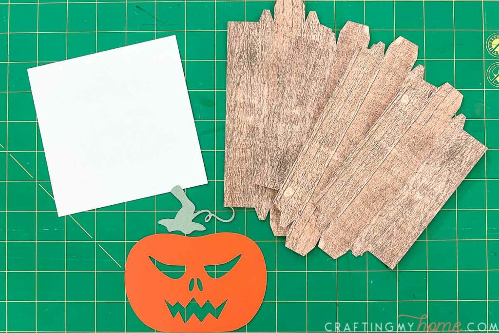All the pieces for one of the simple Halloween signs cut out of paper. 
