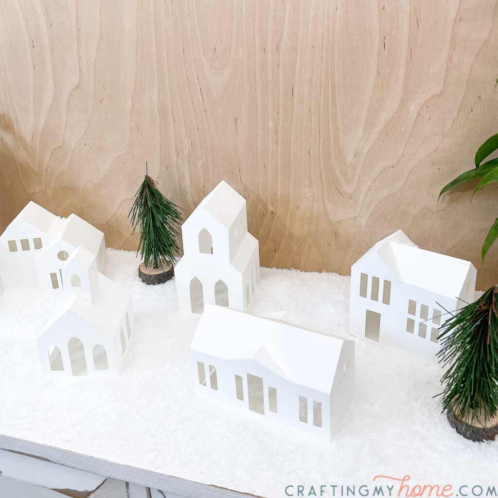 DIY paper Christmas village with 5 different style houses.