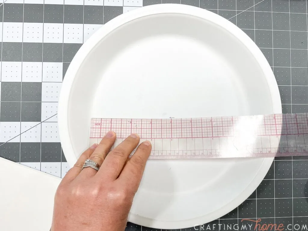 Marking the center of the pie plate. 