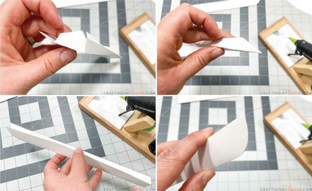Glueing the blades for the sled together out of white cardstock.