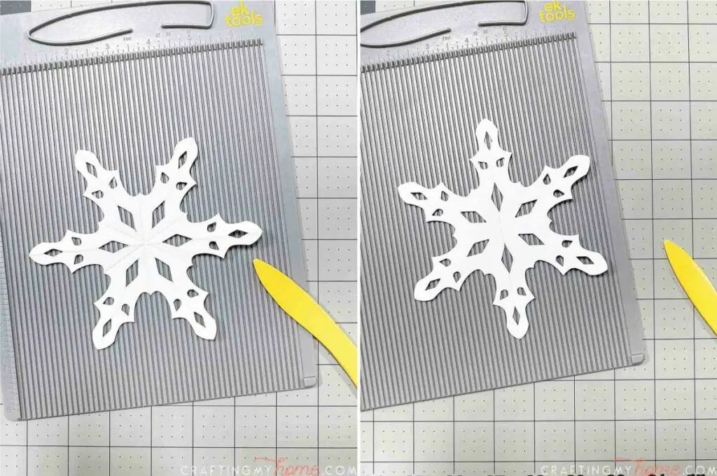 Using a scoring board to make folding the snowflakes easier.