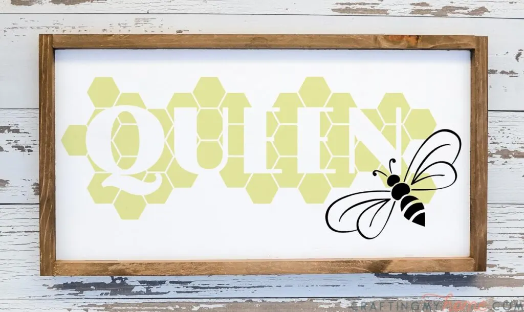 Farmhouse wood sign with Queen Bee SVG on it in a honeycomb pattern. 