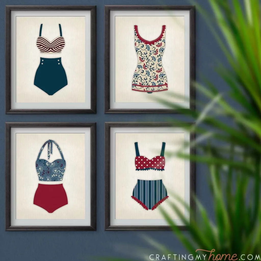 Vintage bathing suit wall art in frames on a navy blue wall. 