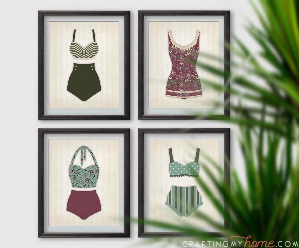 Retro bathing suit art prints in frames with a tropical tree in the foreground. 