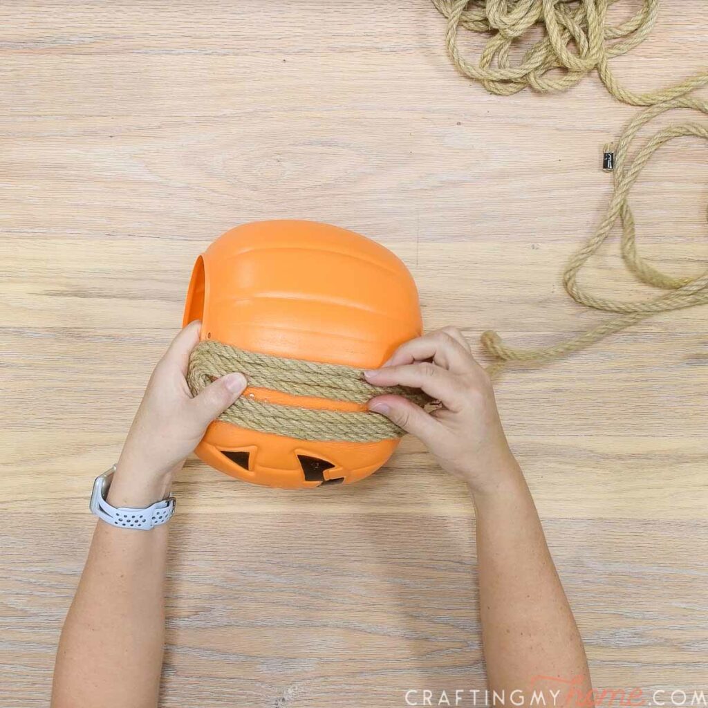 Filling in the bump out section of the pumpkin with rope. 